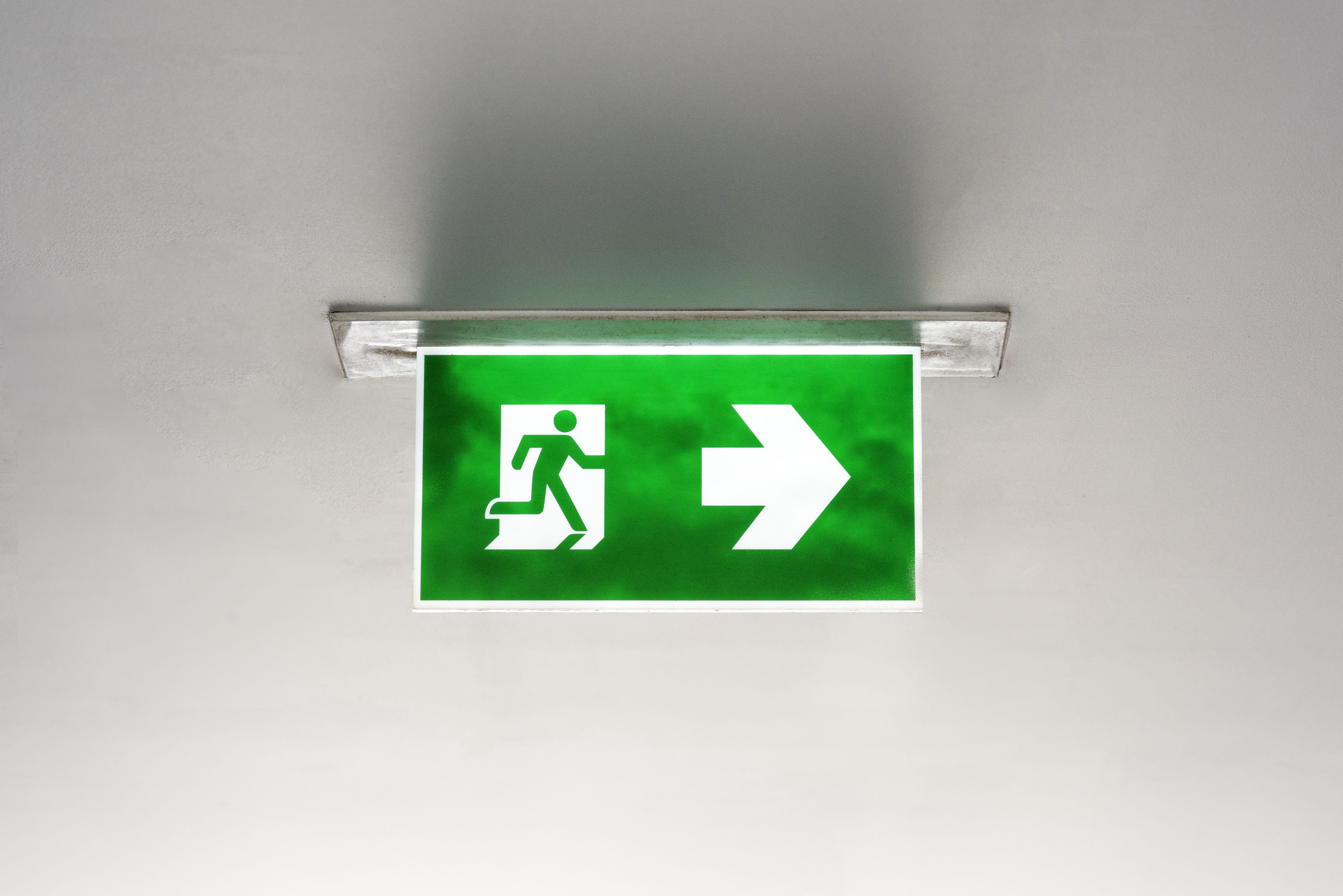 Photo of Green Emergency Exit Sign Ceiling