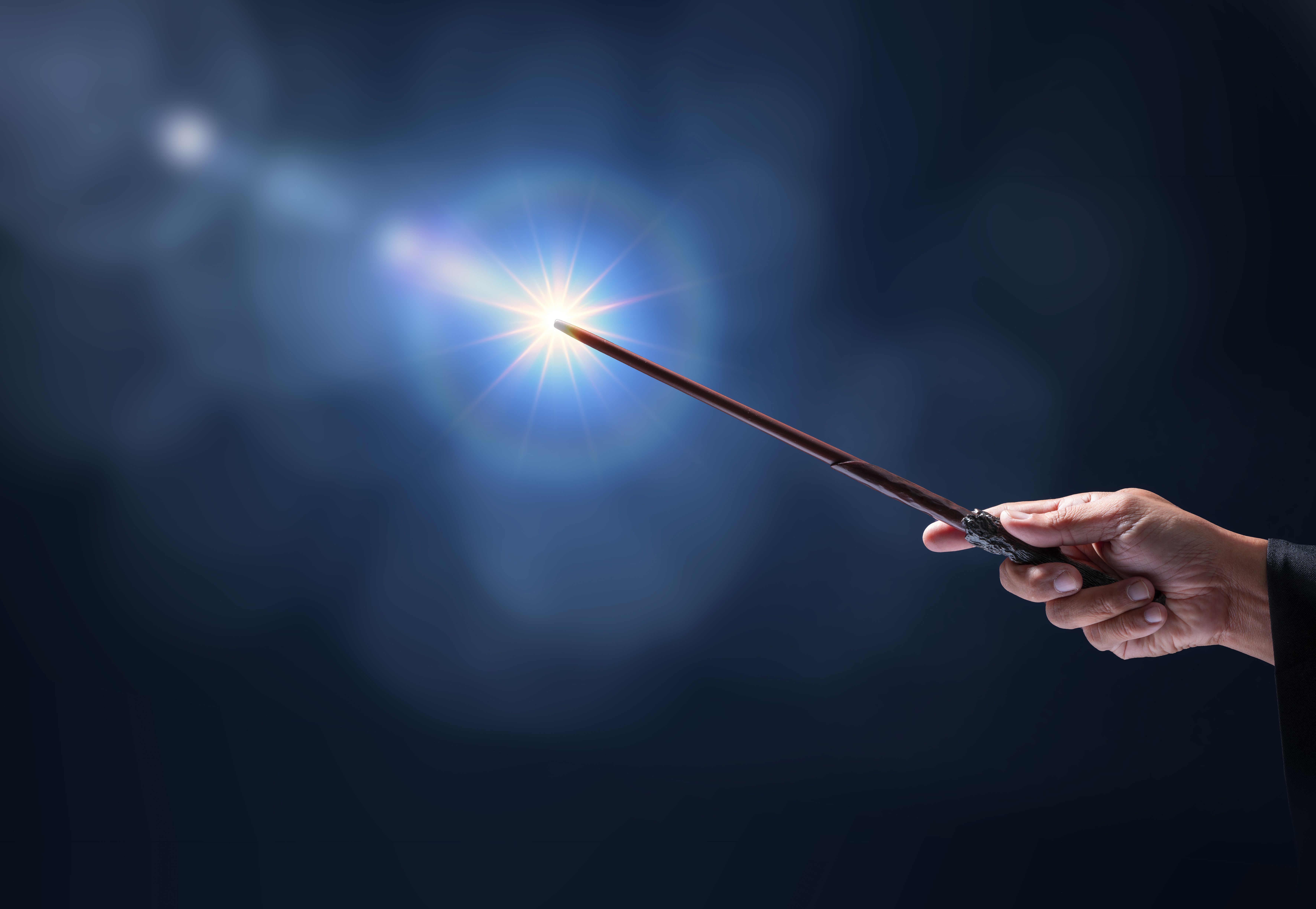 Picture of Magic Wand With Sparkle Blue Background