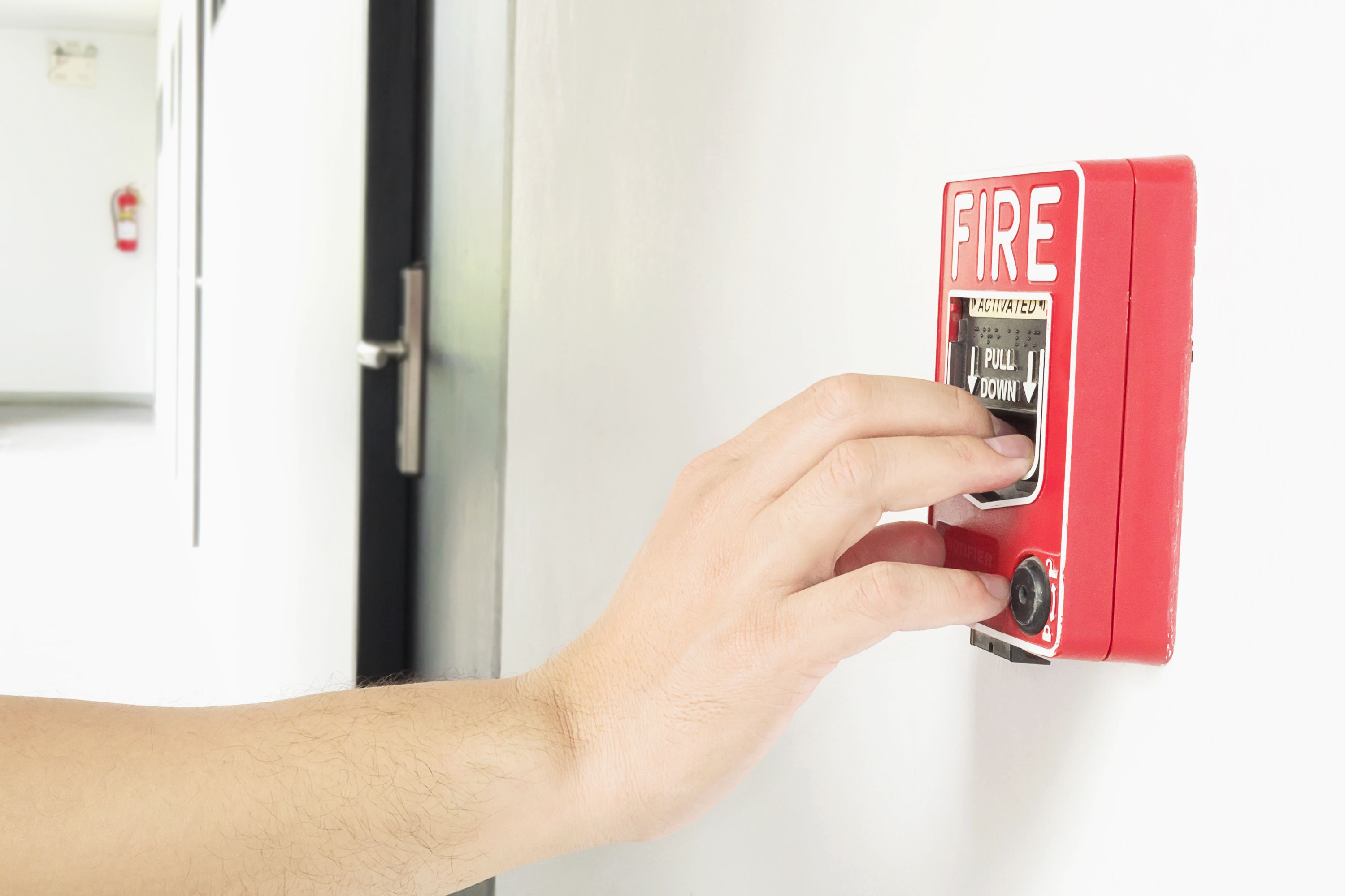 Man Is Reaching His Hand Push Fire Alarm Hand Station